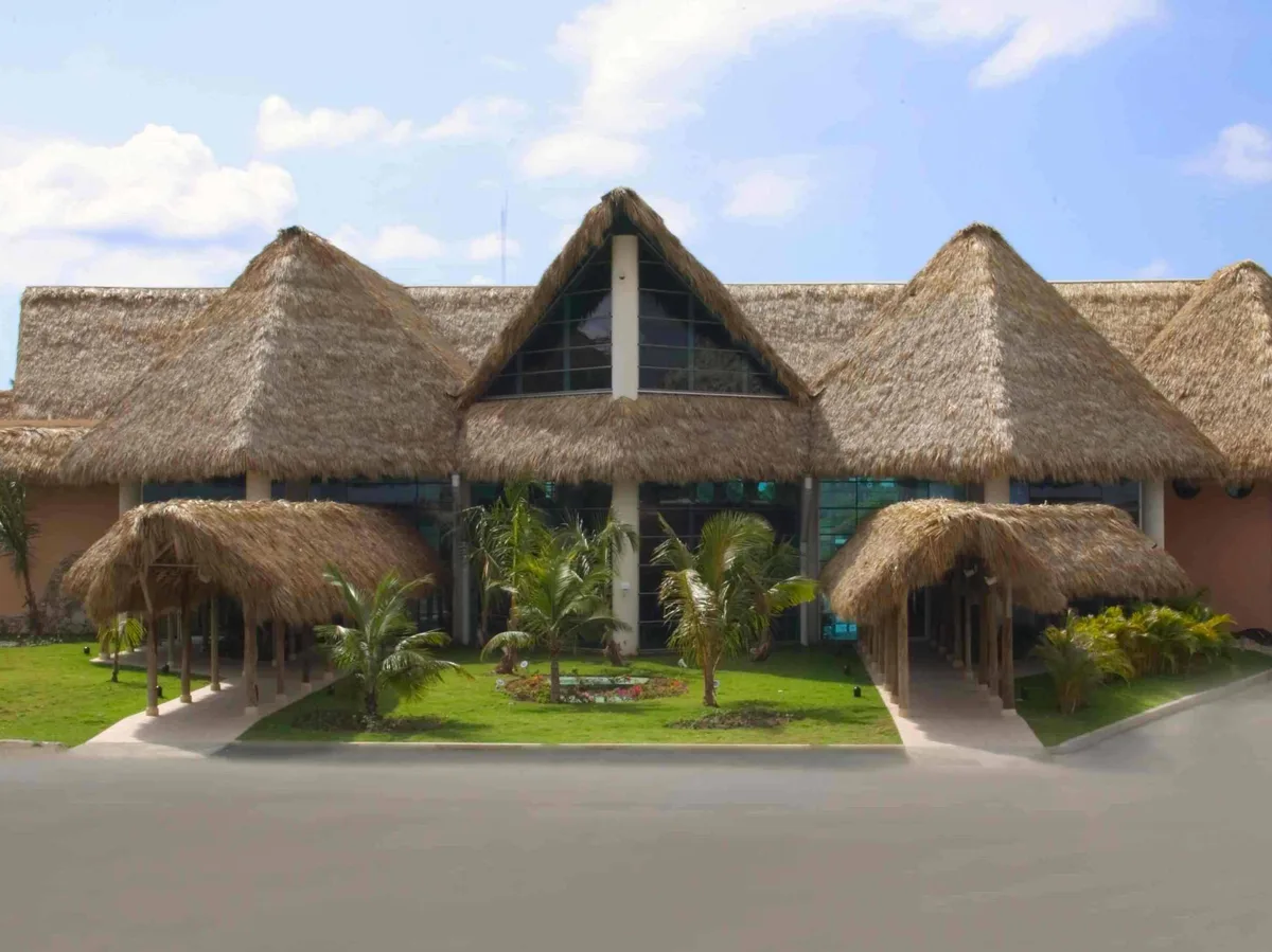 The terminal of Punta Cana International under its thatched roofs
