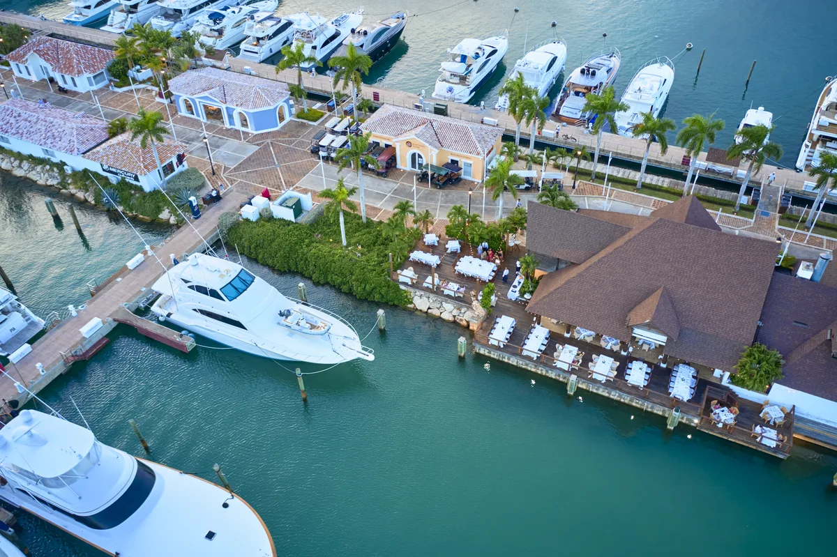 The Marina of Casa de Campo from the air: restaurants, boutiques and yachts along the quay