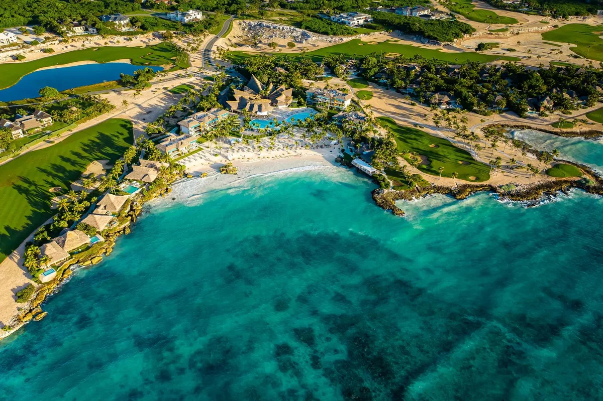 The coast of Cap Cana from the air, the lawn and the bay below